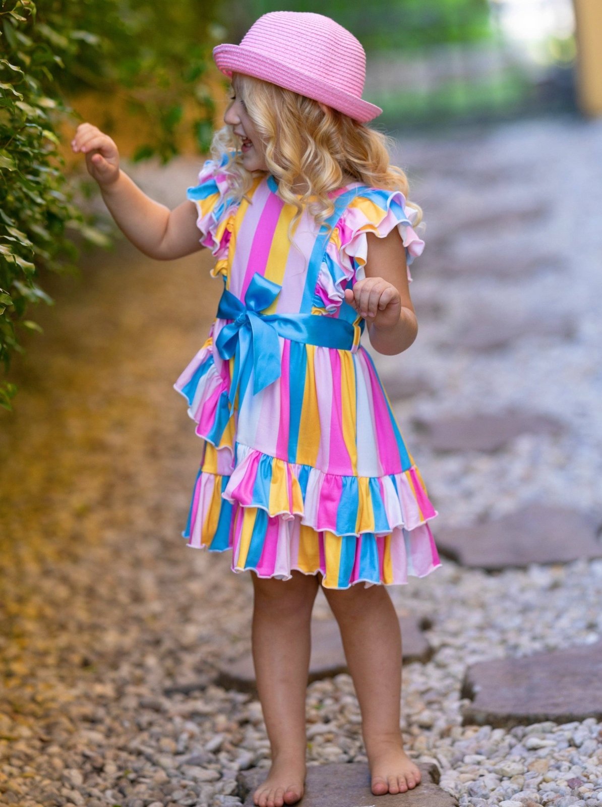 colorful wrap dress EBI neckline and flutter sleeves bring soft movement to the silhouette Final Sale Plus Size Deep