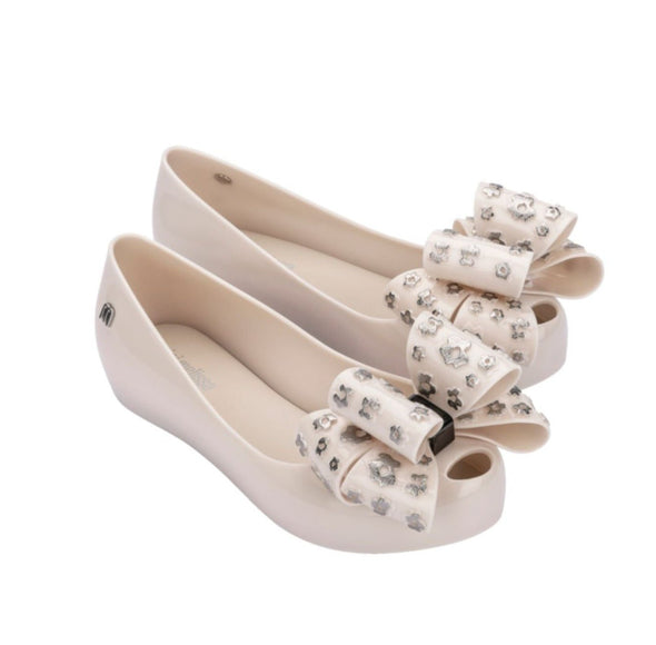 Mini Melissa Girls Beige & Silver Mini Ultragirl Sweet XI Bow Shoes | HONEYPIEKIDS | Kids Boutique